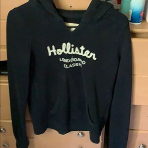 A navy blue Sweater